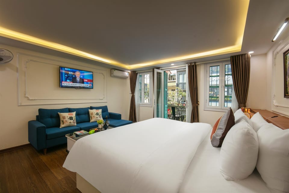 Premium Quadruple Room, 2 Bedrooms, Balcony, City View | Premium bedding, down comforters, minibar, in-room safe