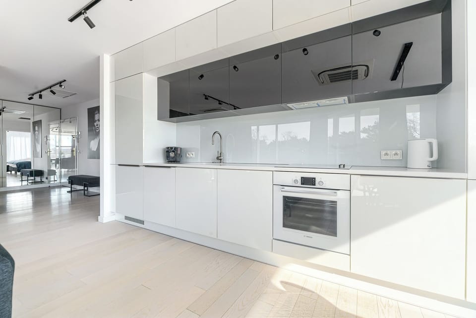 Executive Apartment, Partial Sea View | Living area | Flat-screen TV