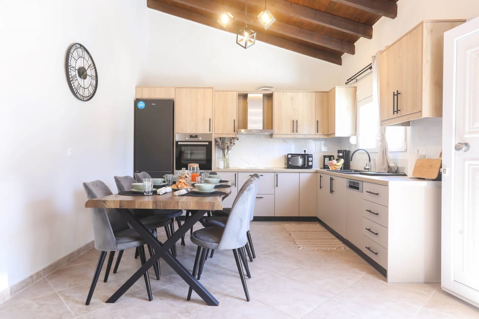 Dining Area with Spacious Wooden Table – A family-friendly spot for meals together.