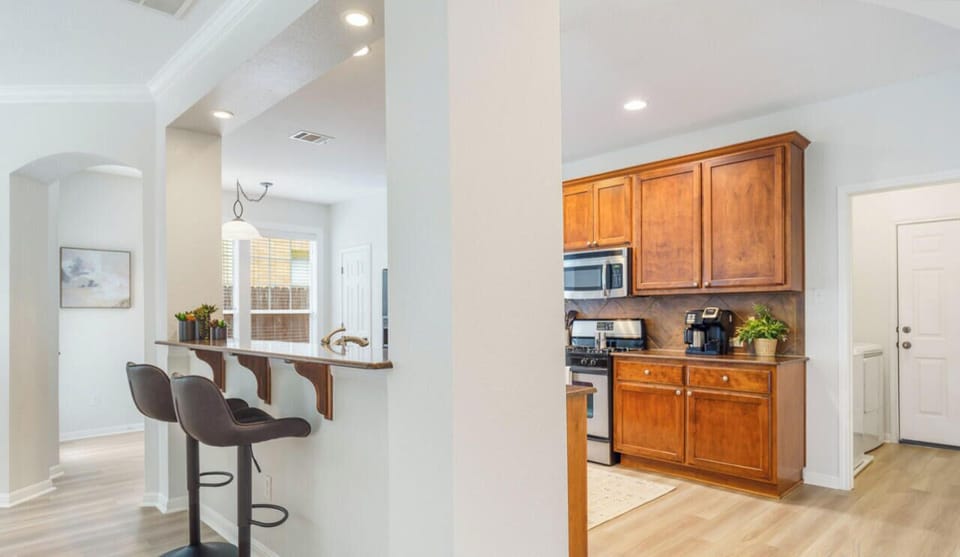 Large fully equipped kitchen with all the essential plus bar top seating