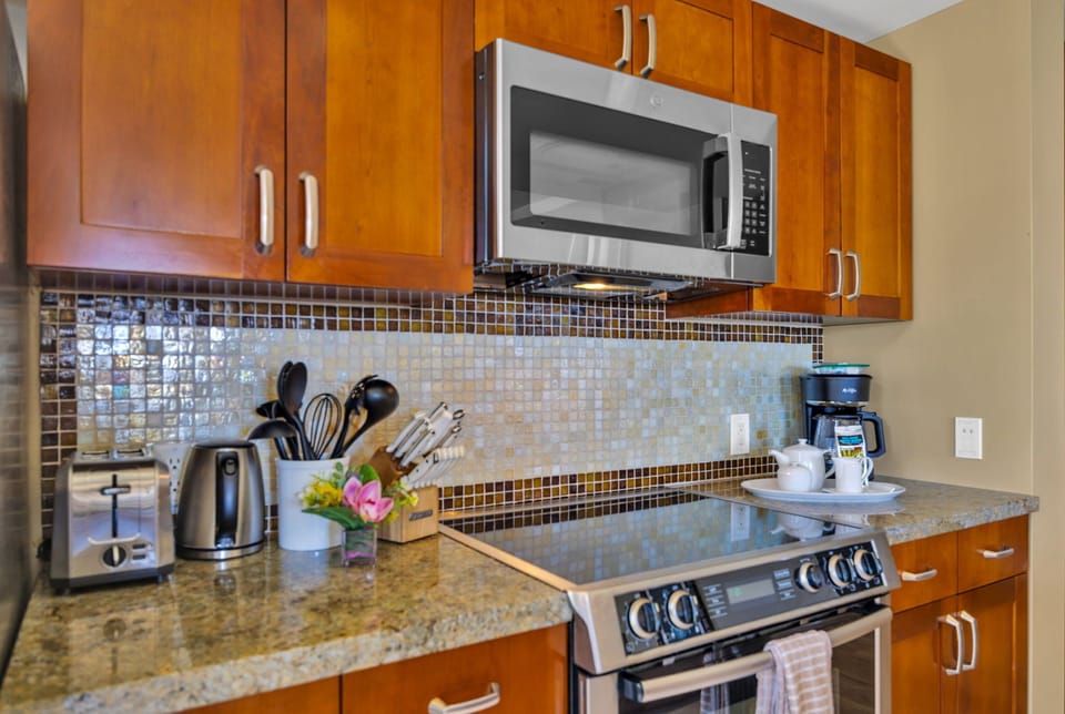 Fully equipped kitchen with stainless steel appliances