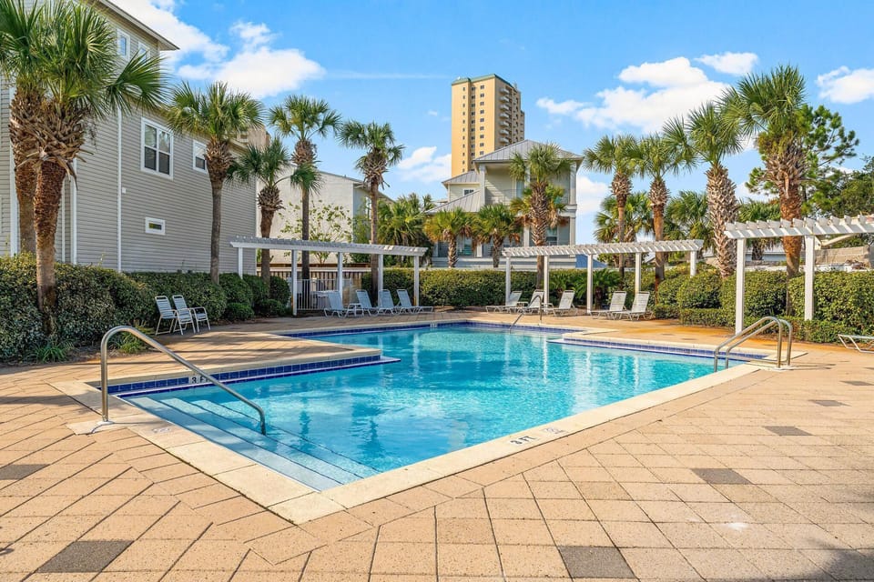 Enjoy The Spacious Pool Located Just Steps From Your Front Door