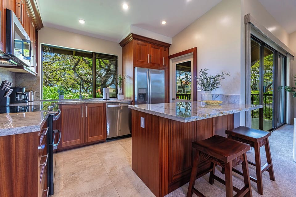There is seating for two at the kitchen