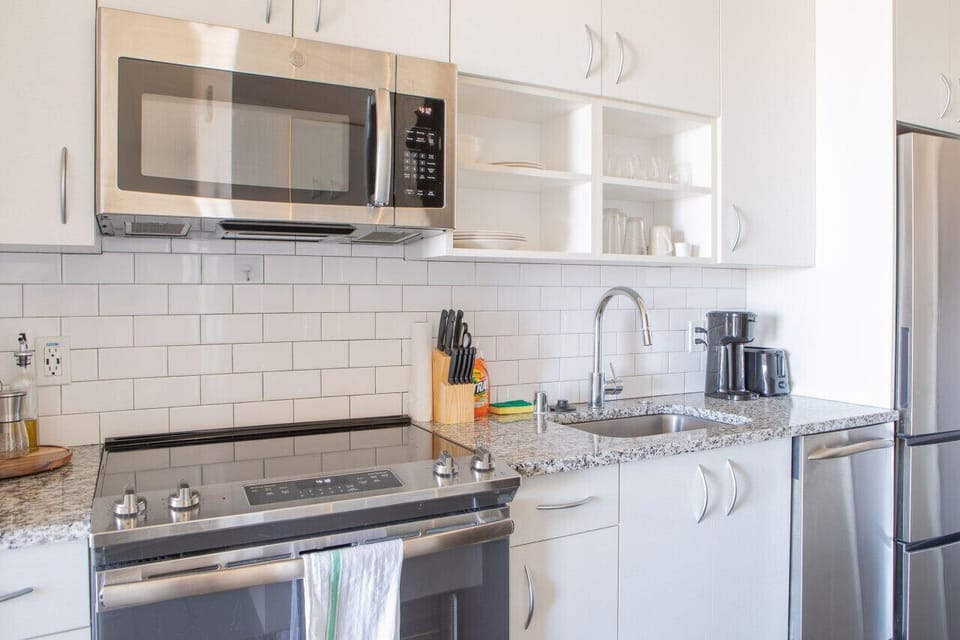 Chef-ready kitchen featuring modern appliances and all the essentials for a home-cooked meal
