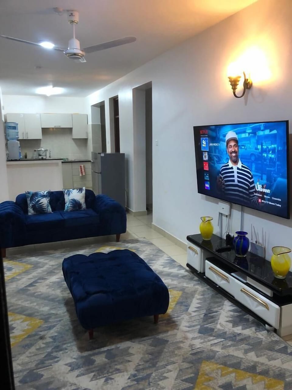 Business Apartment | Living area | 32-inch Smart TV with digital channels