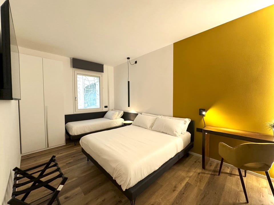 Deluxe Triple Room | Individually decorated, individually furnished, desk, laptop workspace
