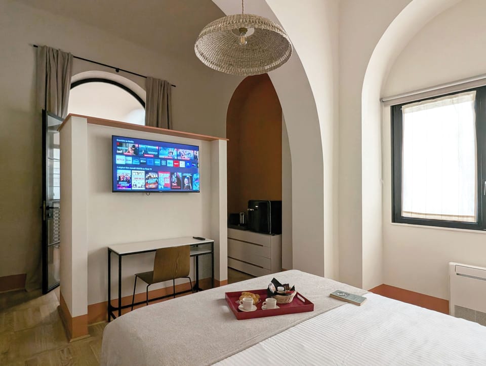 Premium bedding, memory foam beds, desk, laptop workspace
