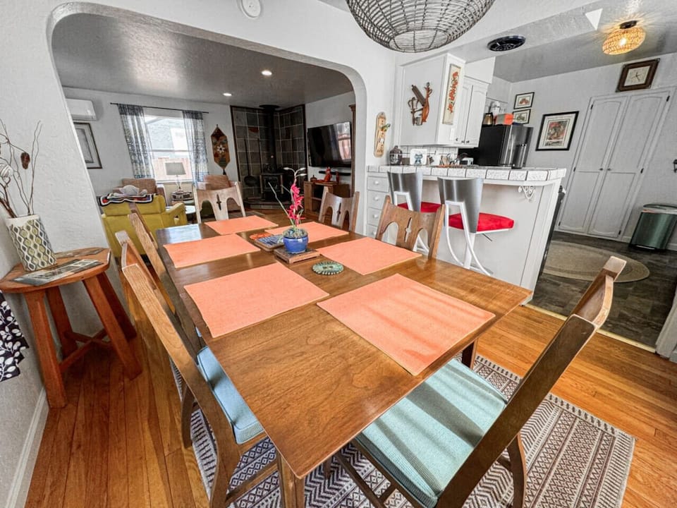 Large dining table with seating for the whole group—perfect for shared meals, game nights, and making memories together.