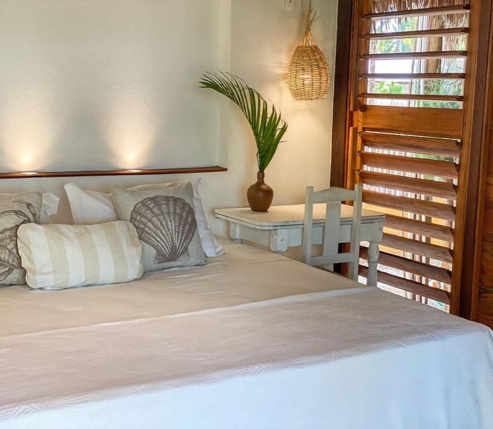 Deluxe Bungalow, Balcony, Pool View | In-room safe, desk, blackout drapes, free WiFi