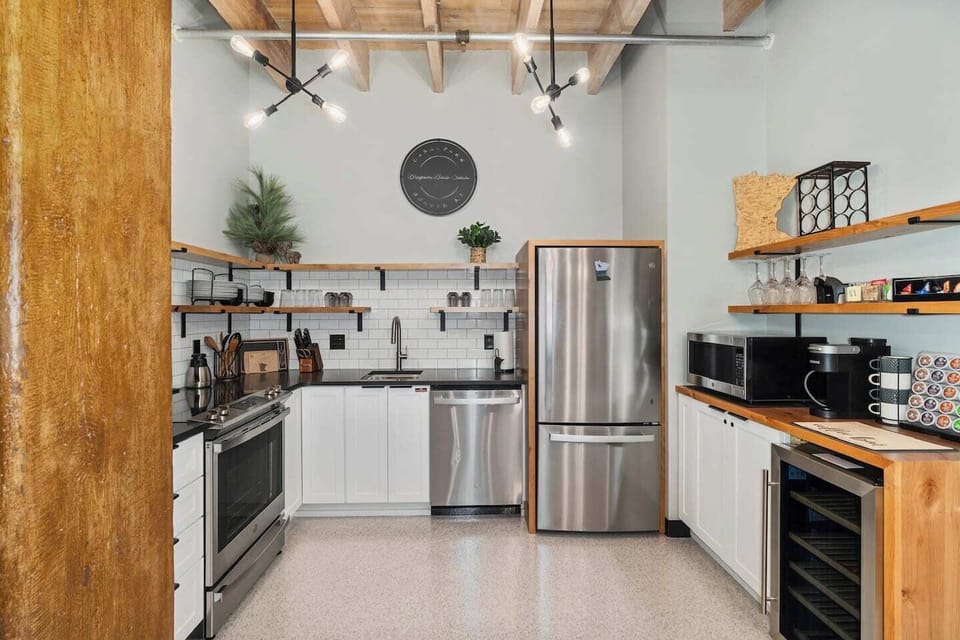 Welcome to your modern kitchen, where sleek meets chic! Fully stocked and featuring cool industrial details, it’s the perfect playground for your culinary adventures. Cooking here is always a blast!