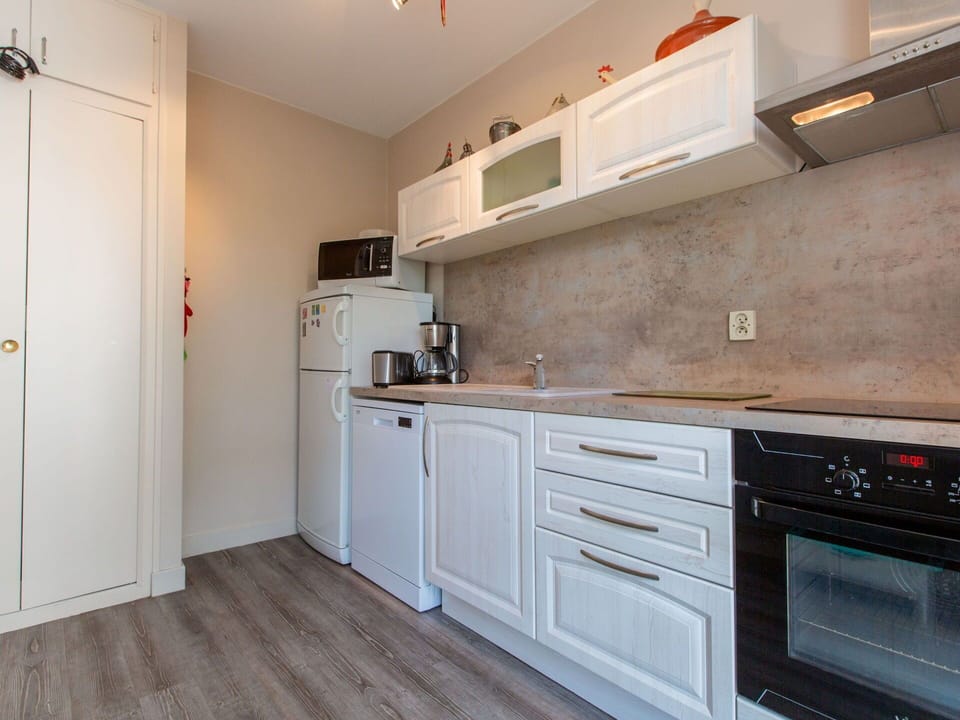 Cabinetry, Property, Furniture, Countertop, Building, Drawer, Wood, Kitchen, Kitchen Stove, Kitchen Appliance