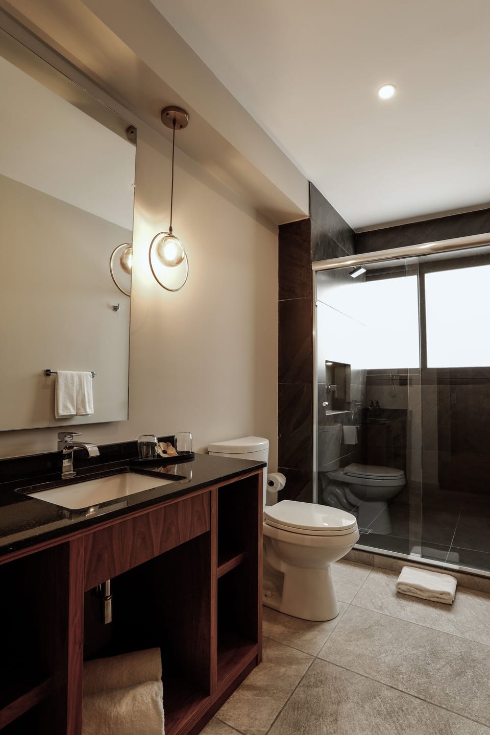 Bathtub, eco-friendly toiletries, hair dryer, towels