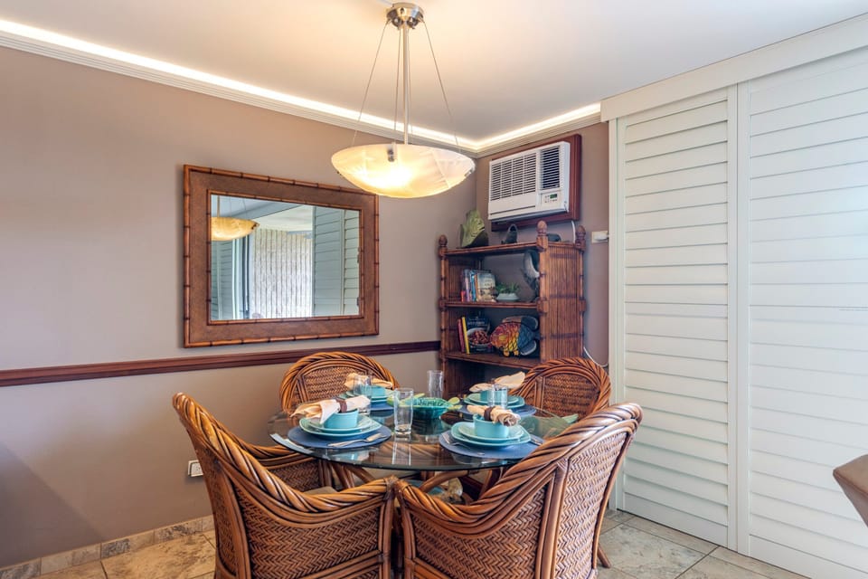 Window AC and ceiling fan to help keep you cool