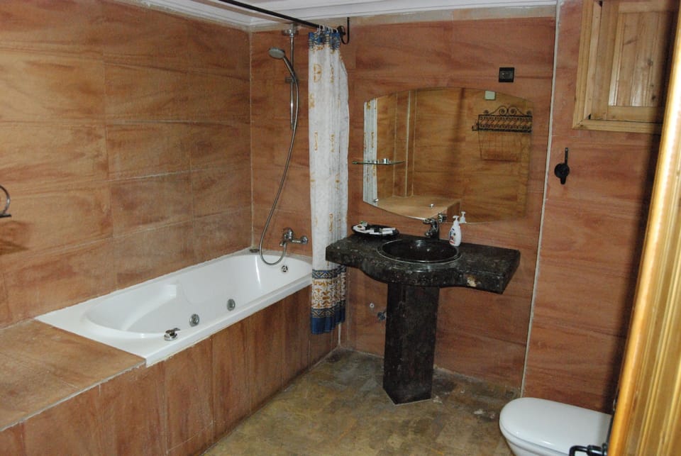 Bathtub, hair dryer (on request), slippers, towels