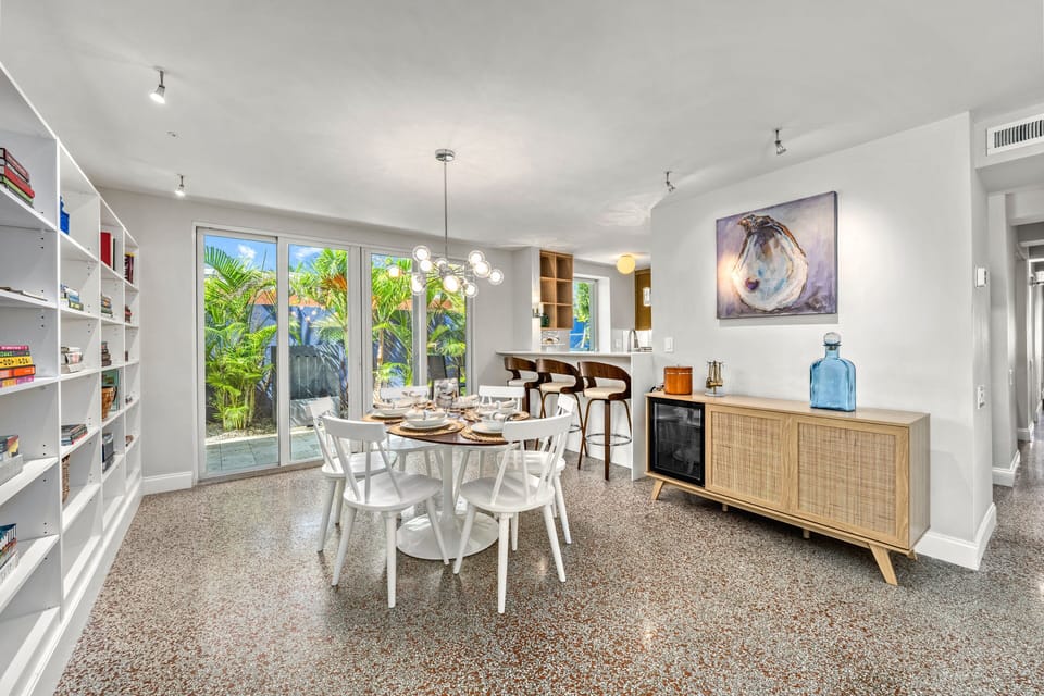 View from the dining room reveals the tranquil standalone fountain, adding a soft bubbling soundtrack to every meal.