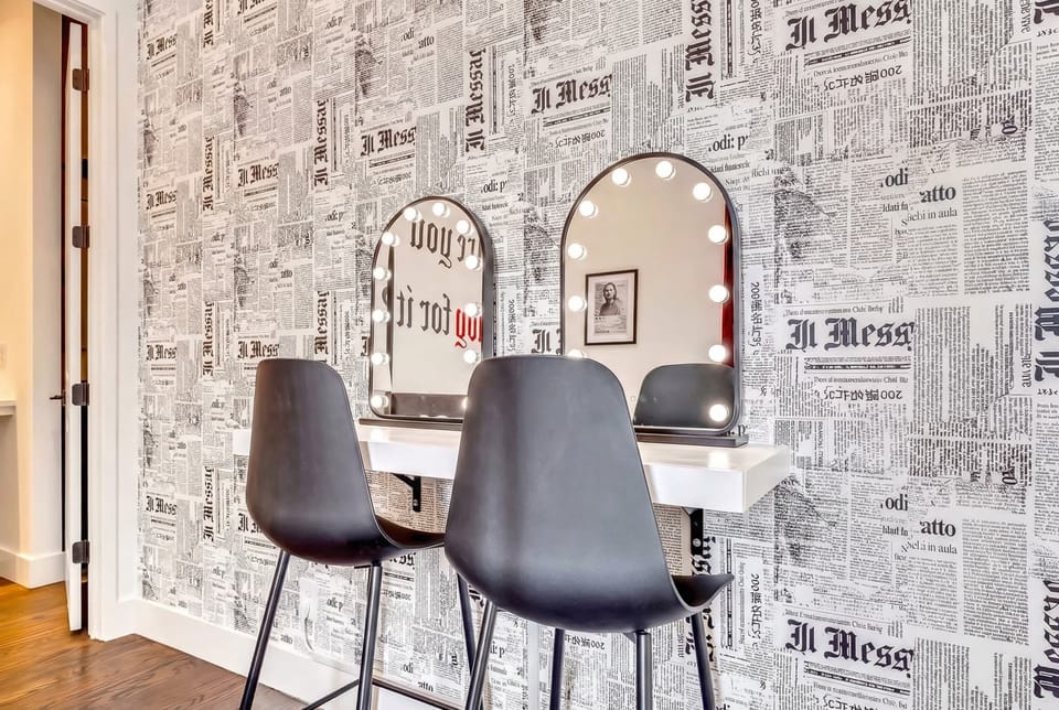 Enter this stylish oasis, ideal for pre-game prep before exploring Downtown Nashville. This chic vanity area adds a luxurious touch to your bachelorette party or family reunion, making every gathering feel exclusive and upscale.