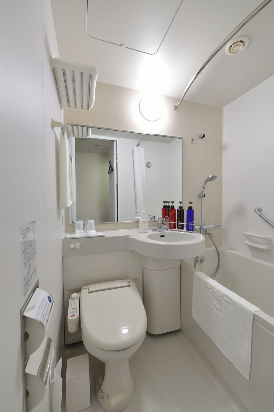 Combined shower/tub, free toiletries, hair dryer, slippers