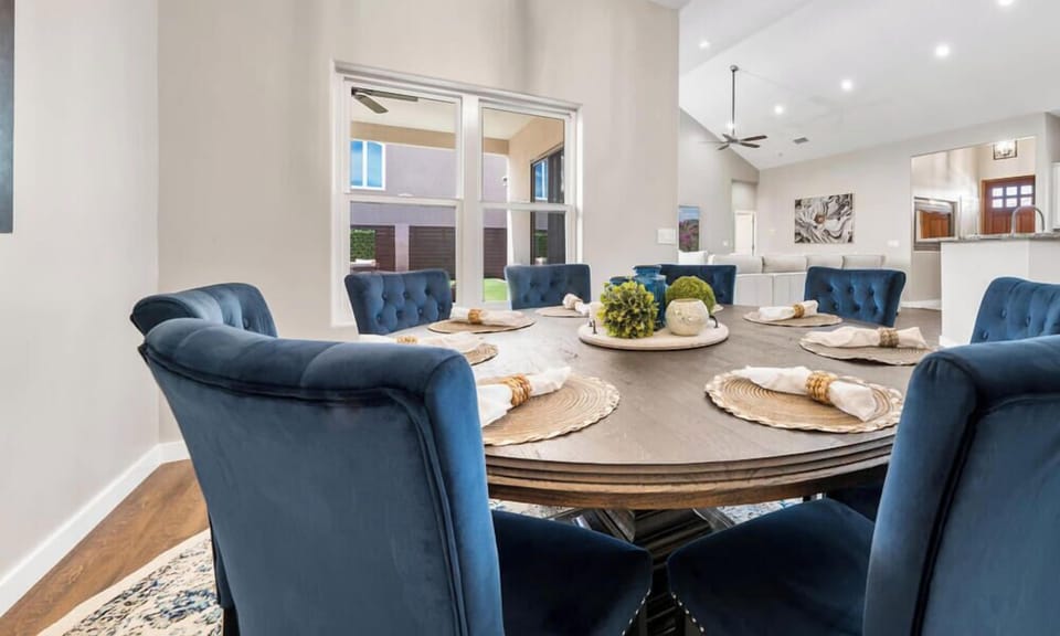 "Indulge in Modern Elegance: Luxurious Stay with Designer Kitchen & Lush Seating - Your Perfect Vacation Home at Irvie Homes #VacationRental #LuxuryStay #ModernDesign #ComfortLiving"