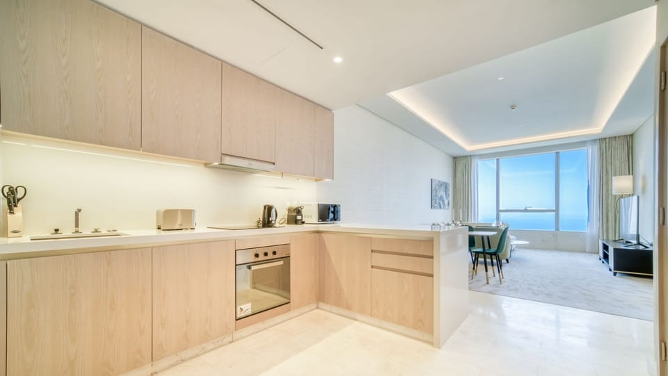 Deluxe Apartment, Sea View | Private kitchen | Full-size fridge, microwave, oven, coffee/tea maker