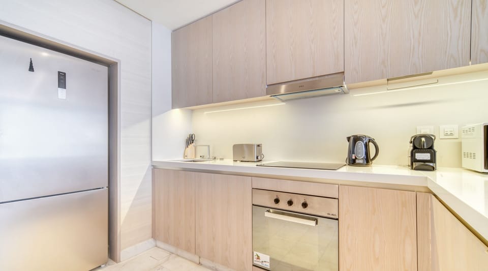 Deluxe Apartment, Sea View | Private kitchen | Full-size fridge, microwave, oven, coffee/tea maker