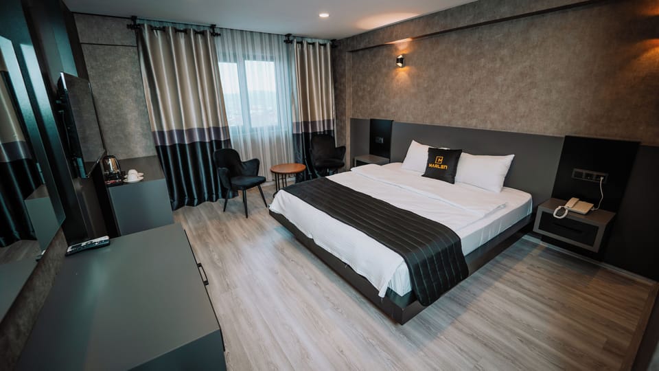 Premium bedding, minibar, in-room safe, desk