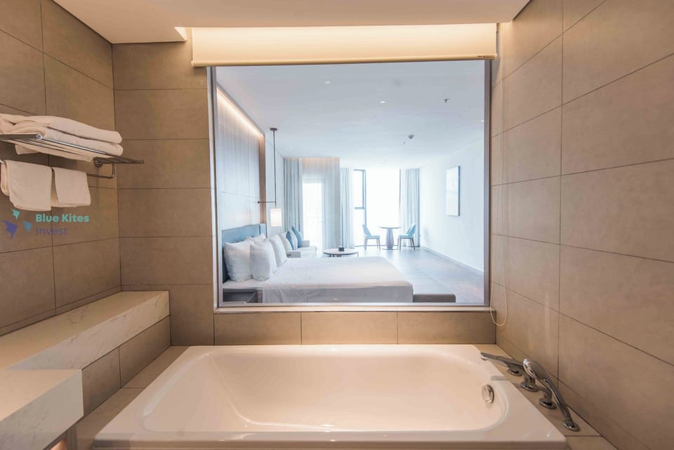 Luxury Apartment, 2 Bedrooms, City View | Bathroom | Rainfall showerhead, free toiletries, hair dryer, bathrobes