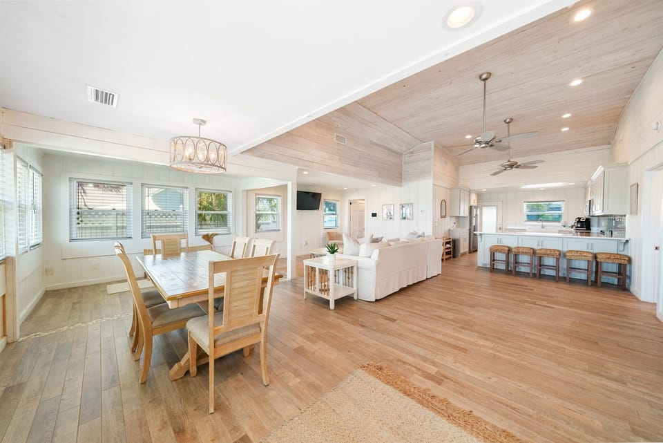 Relax in this bright, open-concept space where coastal elegance meets comfort. Your family will love gathering around the spacious dining table or unwinding in the living area.