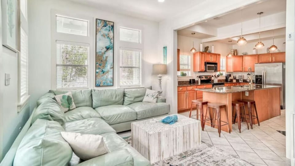Settle into your spacious living area with plush sectional seating, then prepare meals in your fully-equipped kitchen with granite counters and stainless appliances.