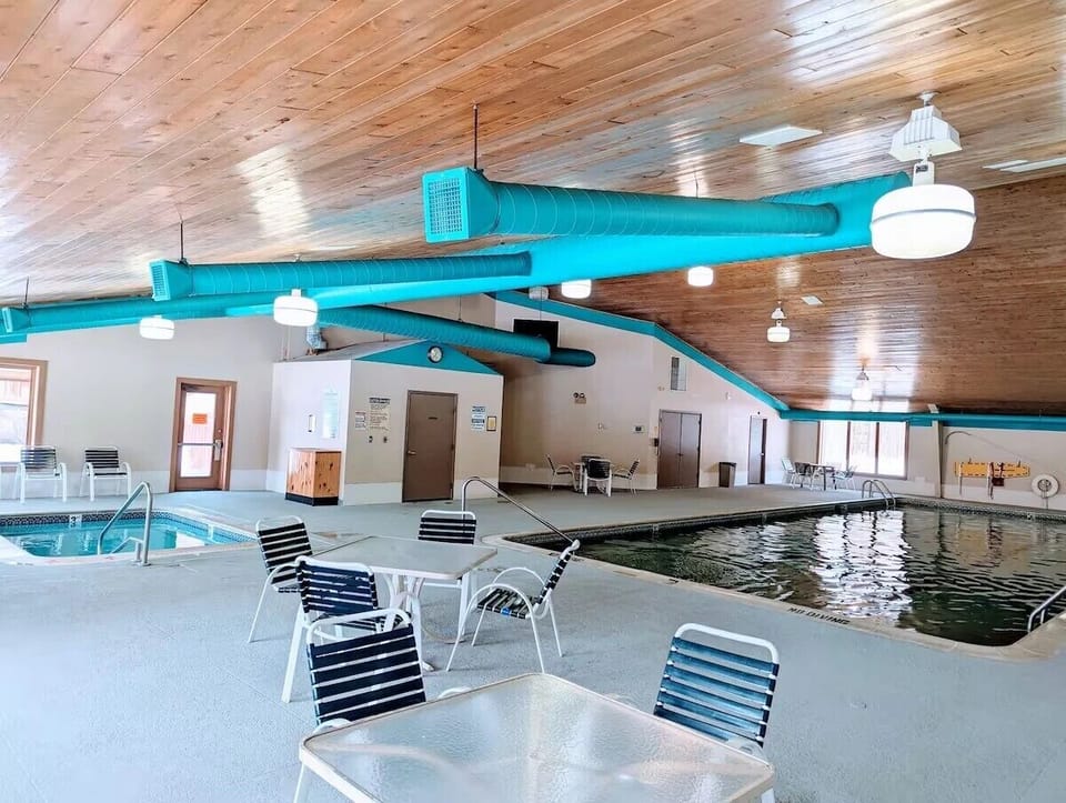 Indoor pool and hot tub at the Michaywe clubhouse - guest access included with your stay