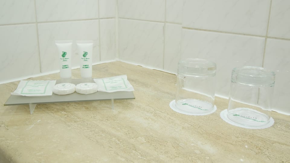 Separate tub and shower, rainfall showerhead, hair dryer, towels