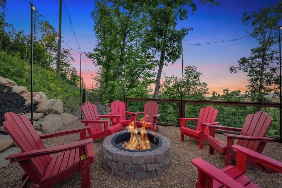Gather around the fire pit under string lights and mountain skies.