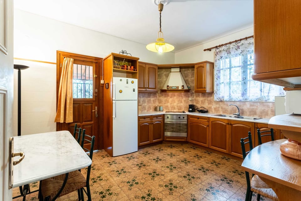 Fully-equipped kitchen in separate room