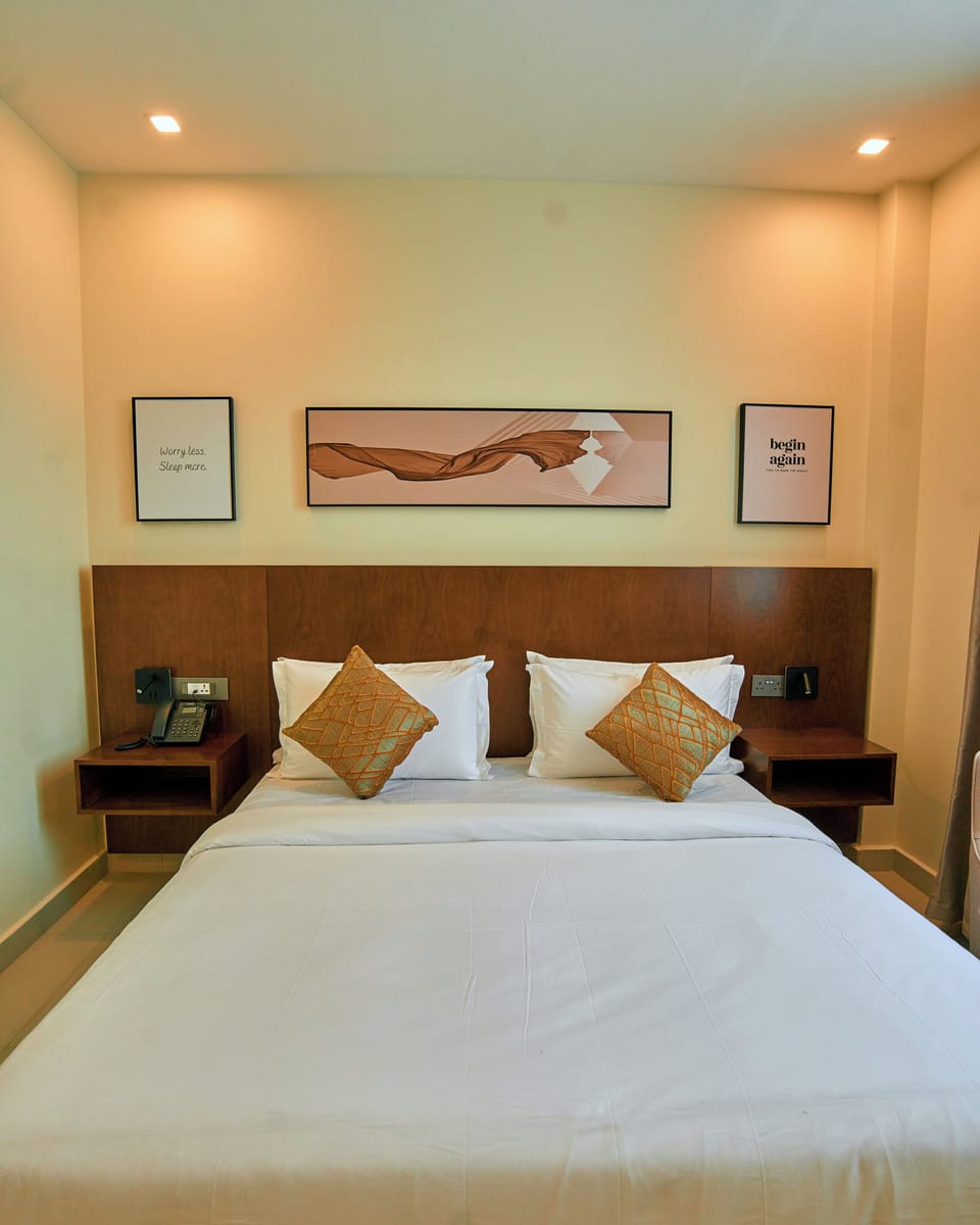 Deluxe Double Room, City View | In-room safe, desk, laptop workspace, iron/ironing board
