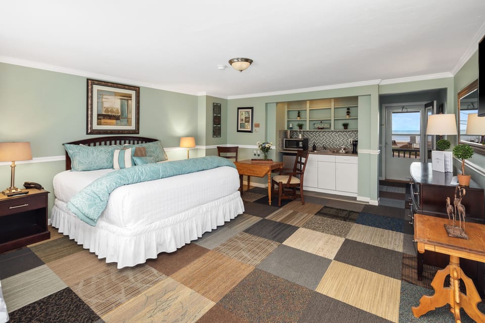 Partial Ocean View King Room | Premium bedding, blackout drapes, iron/ironing board, rollaway beds