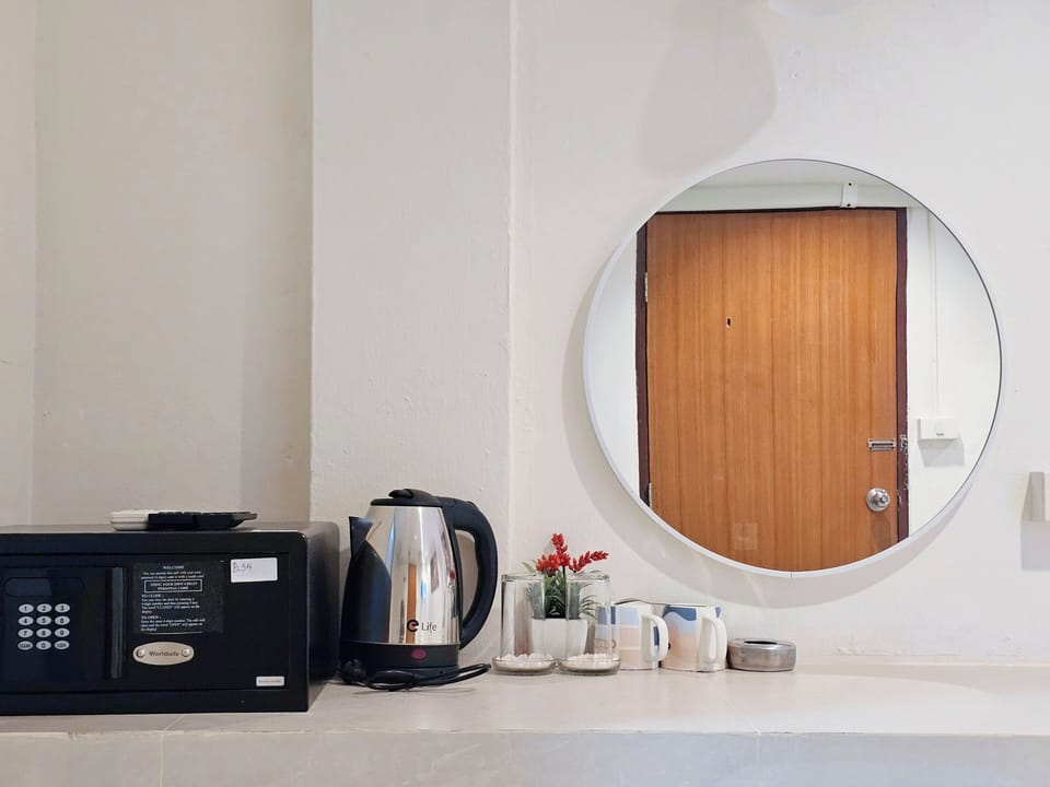Standard Double Room, No Windows | In-room safe, desk, laptop workspace, blackout drapes