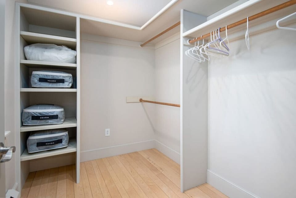 Walk-in closet with plenty of room to organize your wardrobe.