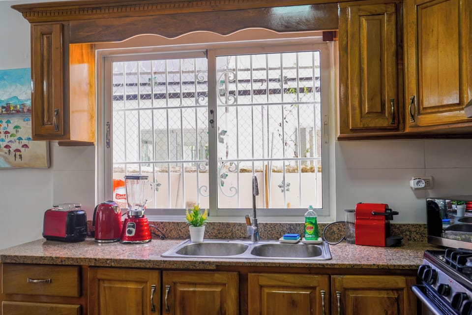 Villa | Private kitchen | Fridge, microwave, oven, stovetop
