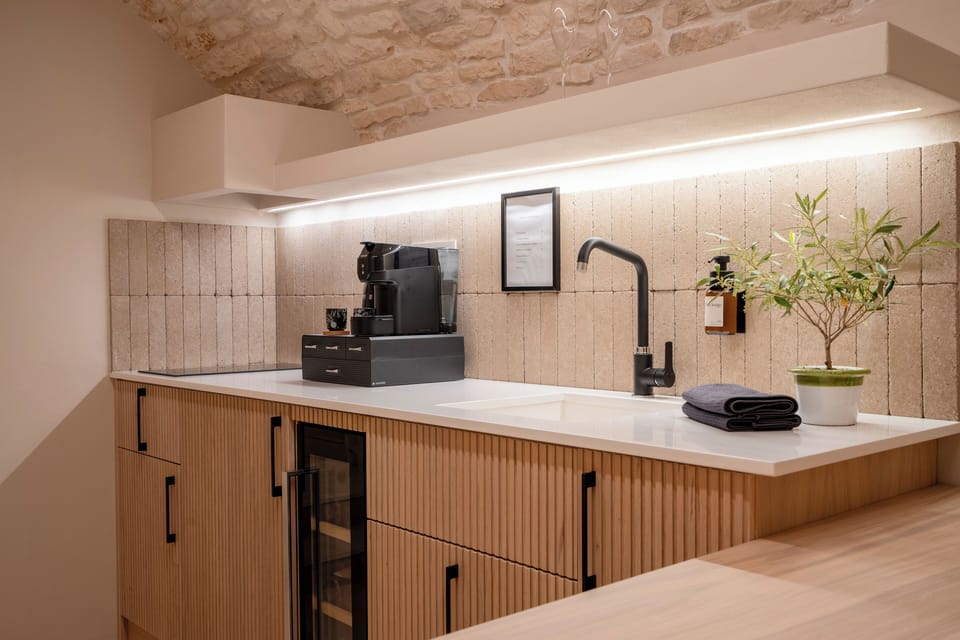 Luxury Suite, 1 King Bed | Private kitchen | Full-size fridge, stovetop, espresso maker, coffee/tea maker