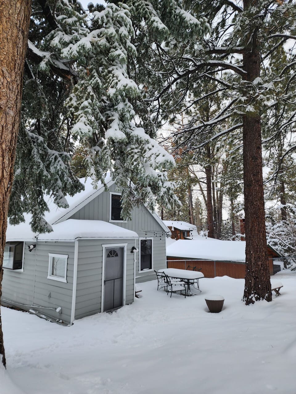 Backyard patio in winter after snowfall
(Snow on the ground not guaranteed)