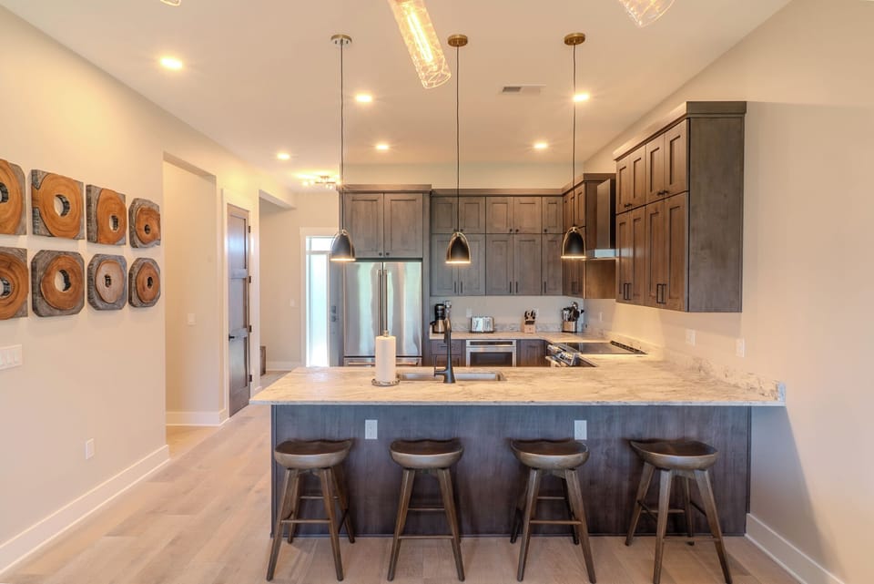Open Kitchen Providing Bar Top Seating
