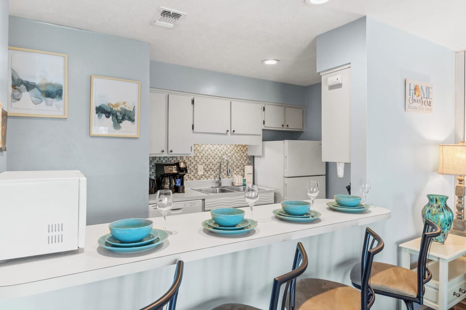 Condo, 1 Bedroom, Poolside | Private kitchen | Full-size fridge, microwave, oven, stovetop