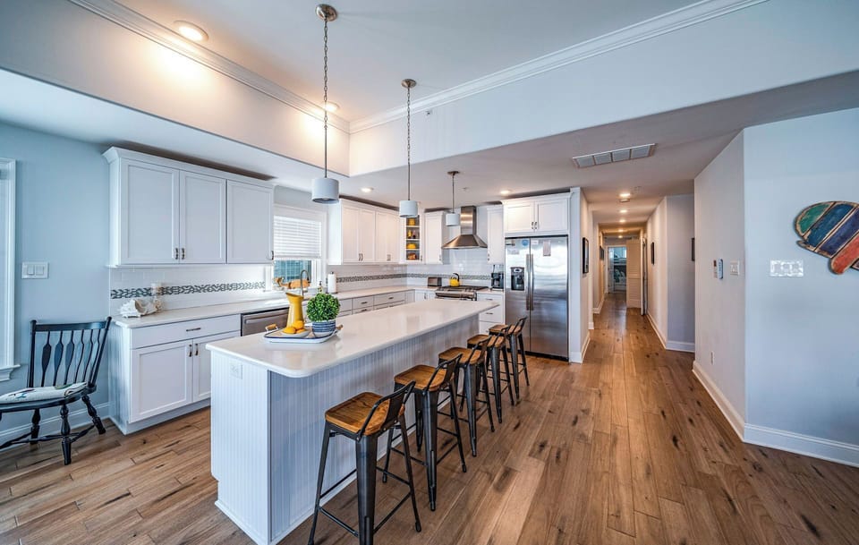 Kitchen island with five bar stools
