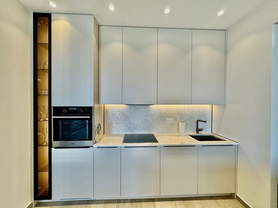 Luxury Apartment, Sea View | Private kitchen | Cookware/dishes/utensils, paper towels