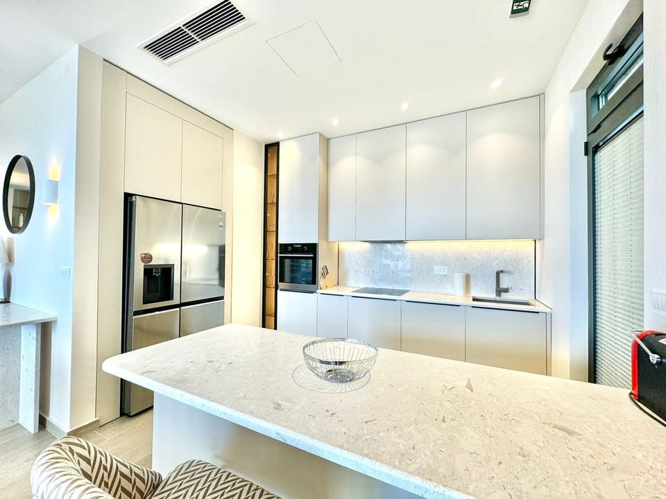Luxury Apartment, Sea View | Private kitchen | Cookware/dishes/utensils, paper towels