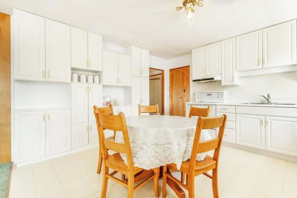 main floor kitchen table seating for 5 or 6.  lots of pantry storage!