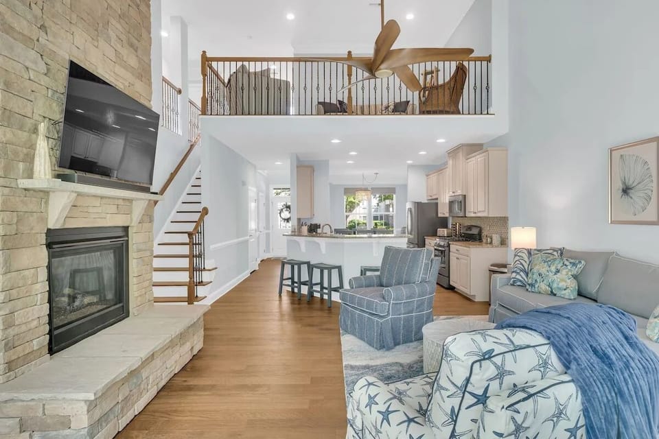 Surround Sound TV, Electronic Ignition Gas Fireplace, Couch and Two Swivel Chairs!