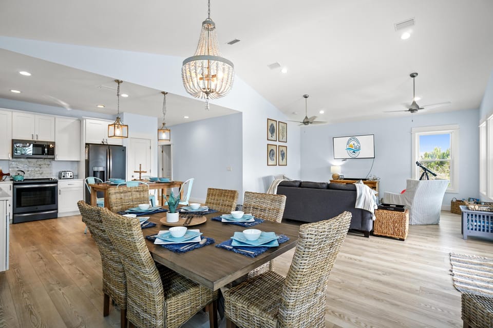 Gather around your spacious dining table where coastal charm meets modern comfort, perfect for memorable meals with loved ones.