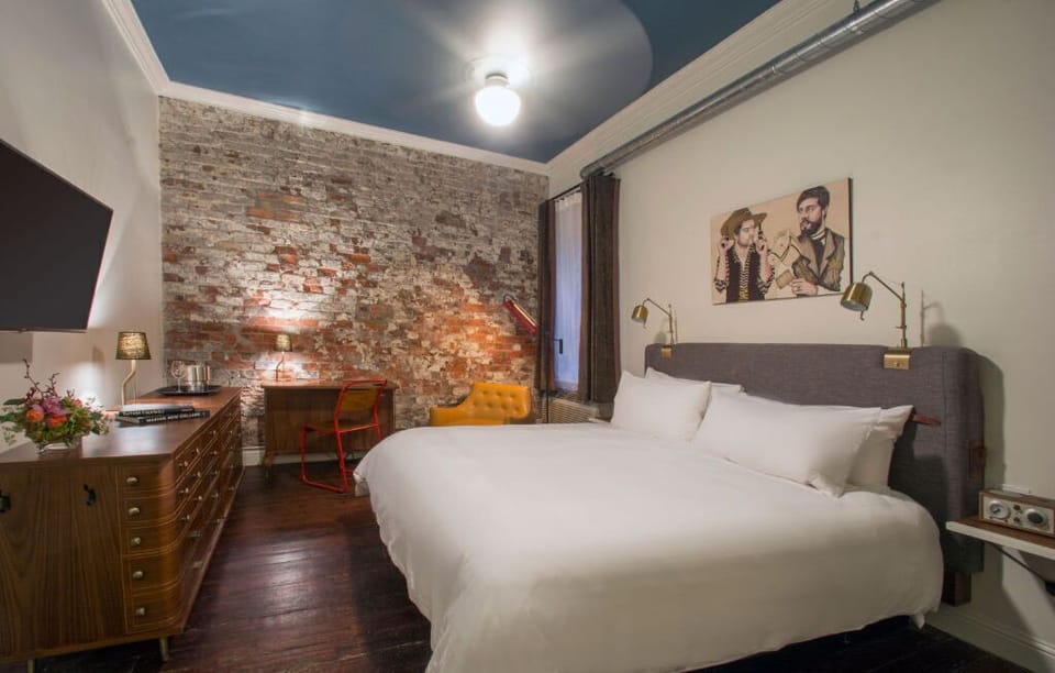 Cozy bedroom nook with warm lighting and eclectic decor