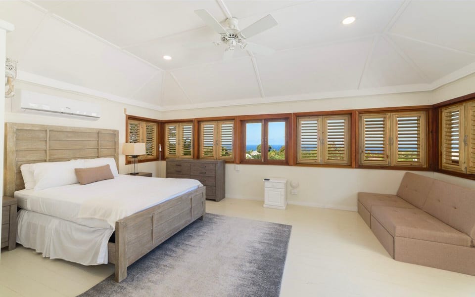 Enjoy panoramic ocean views from this bedroom