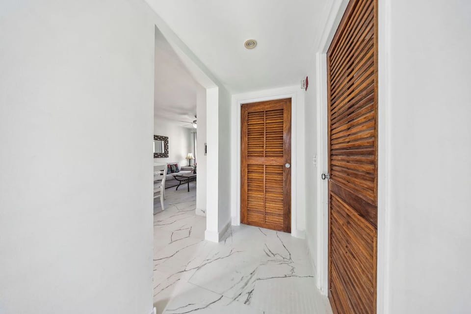 This spacious and well-lit hallway sets the tone for your stay the moment you step inside.
